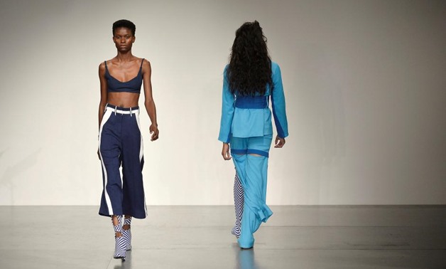 A model displays a garment during Richard Malone's show at London Fashion Week, Britain September 15, 2017. REUTERS/Mary Turner