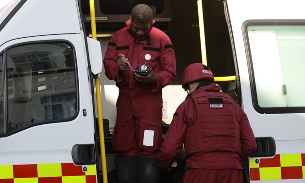 Members of a bomb disposal squad work at a van near Parsons Green tube station in London, Britain September 15, 2017. REUTERS/Kevin Coombs