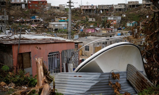 Damaged houses are seen after the area was hit by Hurricane Maria in Canovanas - REUTERS