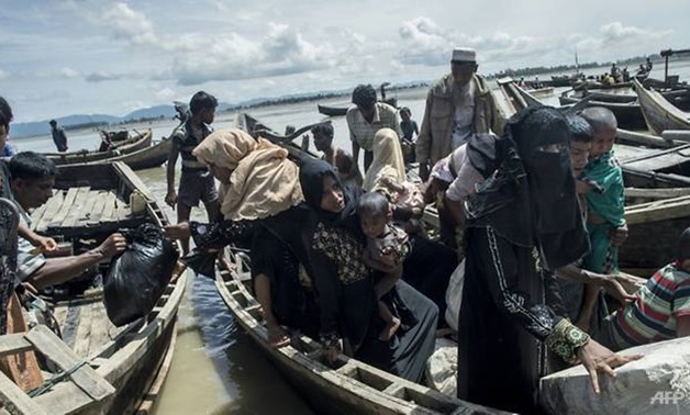 More than 500,000 Muslim Rohingya have fled ethnic bloodshed in Myanmar in the past month and numbers are again swelling. (Photo: AFP/Fred Dufour)
Read more at http://www.channelnewsasia.com/news/asiapacific/rohingya-fleeing-myanmar-say-army-redoubling-p