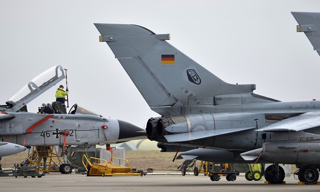 A technician works on a German Tornado jet at the NATO air base in Incirlik, Turkey - REUTERS
