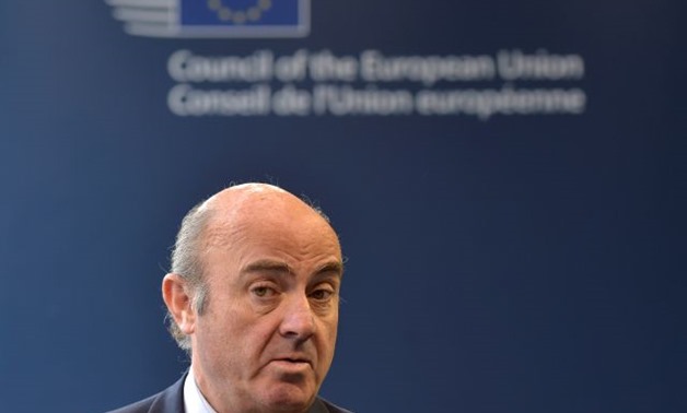 Spain's Finance Minister Luis de Guindos talks to journalists after a European Union finance ministers' meeting in Luxembourg, October 10, 2017. REUTERS/Eric Vidal