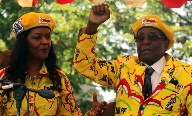 President Robert Mugabe and his wife Grace Mugabe attend a rally of his ruling ZANU-PF party in Harare, Zimbabwe, November 8, 2017.REUTERS/Philimon Bulawayo

