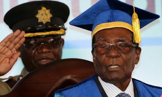 Zimbabwe President Robert Mugabe attends a university graduation ceremony in Harare, Zimbabwe, November 17, 2017. REUTERS/Philimon Bulawayo

