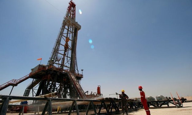 Men work for Iraqi Drilling Company at Rumaila oilfield in Basra, Iraq, May 11, 2017. REUTERS/Essam Al-Sudani