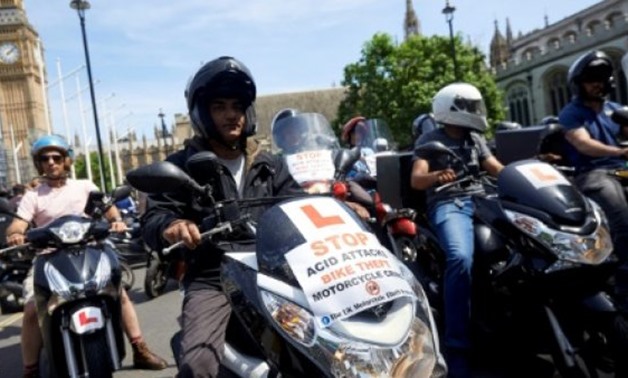 © AFP/File / by Rosie SCAMMELL | Delivery riders protest in London as the number of acid attacks continues to increase