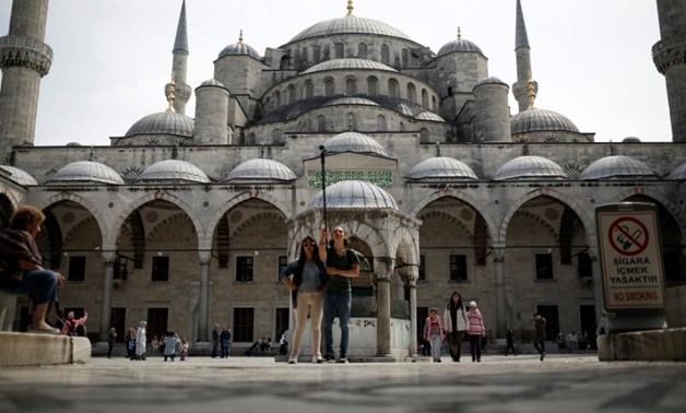 Tourists visit the Ottoman-era Sultanahmet mosque, also known as the Blue Mosque, in Istanbul, Turkey, April 17, 2017. REUTERS/Alkis Konstantinidis
