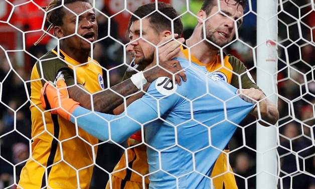 Soccer Football - Premier League - Stoke City vs Brighton & Hove Albion - bet365 Stadium, Stoke-on-Trent, Britain - February 10, 2018 Brighton's Mathew Ryan celebrates with team mates after saving a penalty from Stoke City's Charlie Adam REUTERS/Darren St