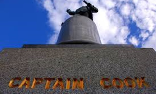 A statue of British explorer Captain James Cook, which includes the inscription 'Discovered this Territory 1770', stands in Hyde Park located in central Sydney, Australia, August 24, 2017. REUTERS/David Gray