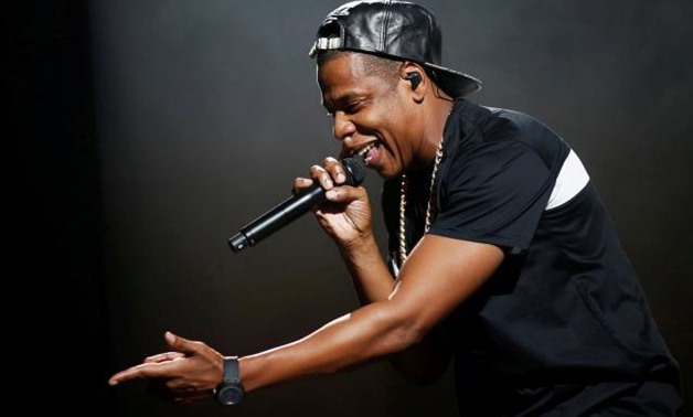 FILE PHOTO: American rapper Jay-Z performs at Bercy stadium in Paris, France, October 17, 2013. REUTERS/Benoit Tessier.