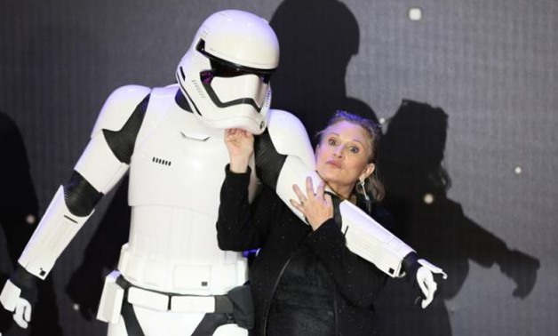 FILE PHOTO: Carrie Fisher poses for cameras as she arrives at the European Premiere of Star Wars, The Force Awakens in Leicester Square, London, on December 16, 2015. REUTERS/Paul Hackett/File Photo.