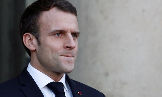 French President Emmanuel Macron waits for a guest at the Elysee Palace in Paris, France, December 17, 2018. REUTERS/Benoit Tessier/File Photo.