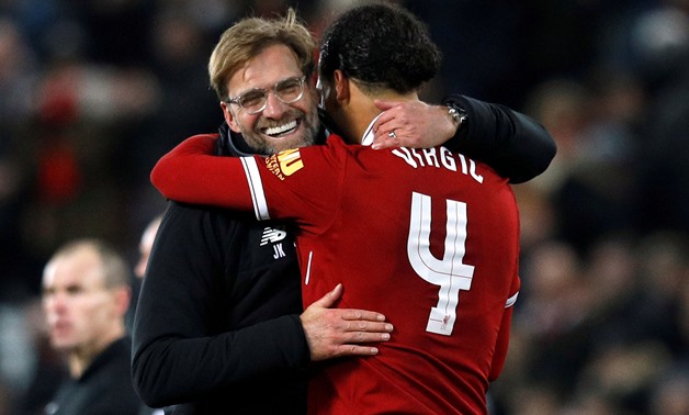 FILE PHOTO: Soccer Football - FA Cup Third Round - Liverpool vs Everton - Anfield, Liverpool, Britain - January 5, 2018 Liverpool manager Juergen Klopp celebrates with Virgil van Dijk at the end of the match REUTERS/Phil Noble/File Photo
