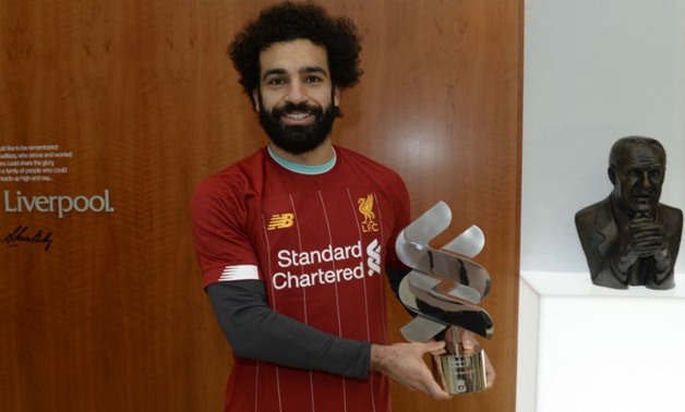 Salah holds the Player of the Month award, photo courtesy of Liverpool website 