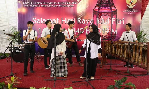 Indonesians perform a musical show during the celebration of Eid alFitr  at the embassy in Cairo- press photo