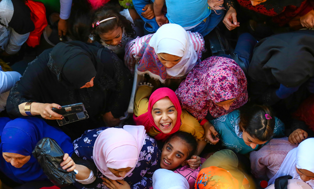 Girls enjoy Eid al-Adha happiness and joy after performing Eid prayer at Al-Azhar Mosque in Old Cairo on August 11, 2019- Egypt Today- Karim Abdel-Aziz.