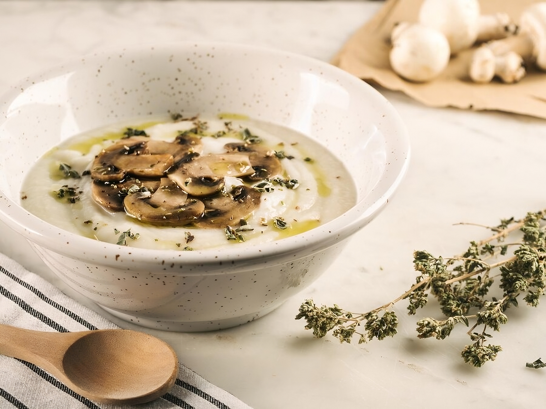 closeup-shot-white-soup-creamy-rustic-with-mushrooms-table_181624-53401-transformed