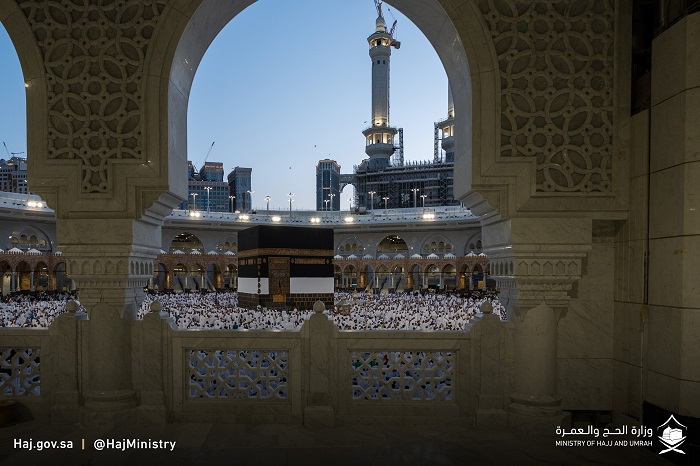 Pilgrims perform prayers