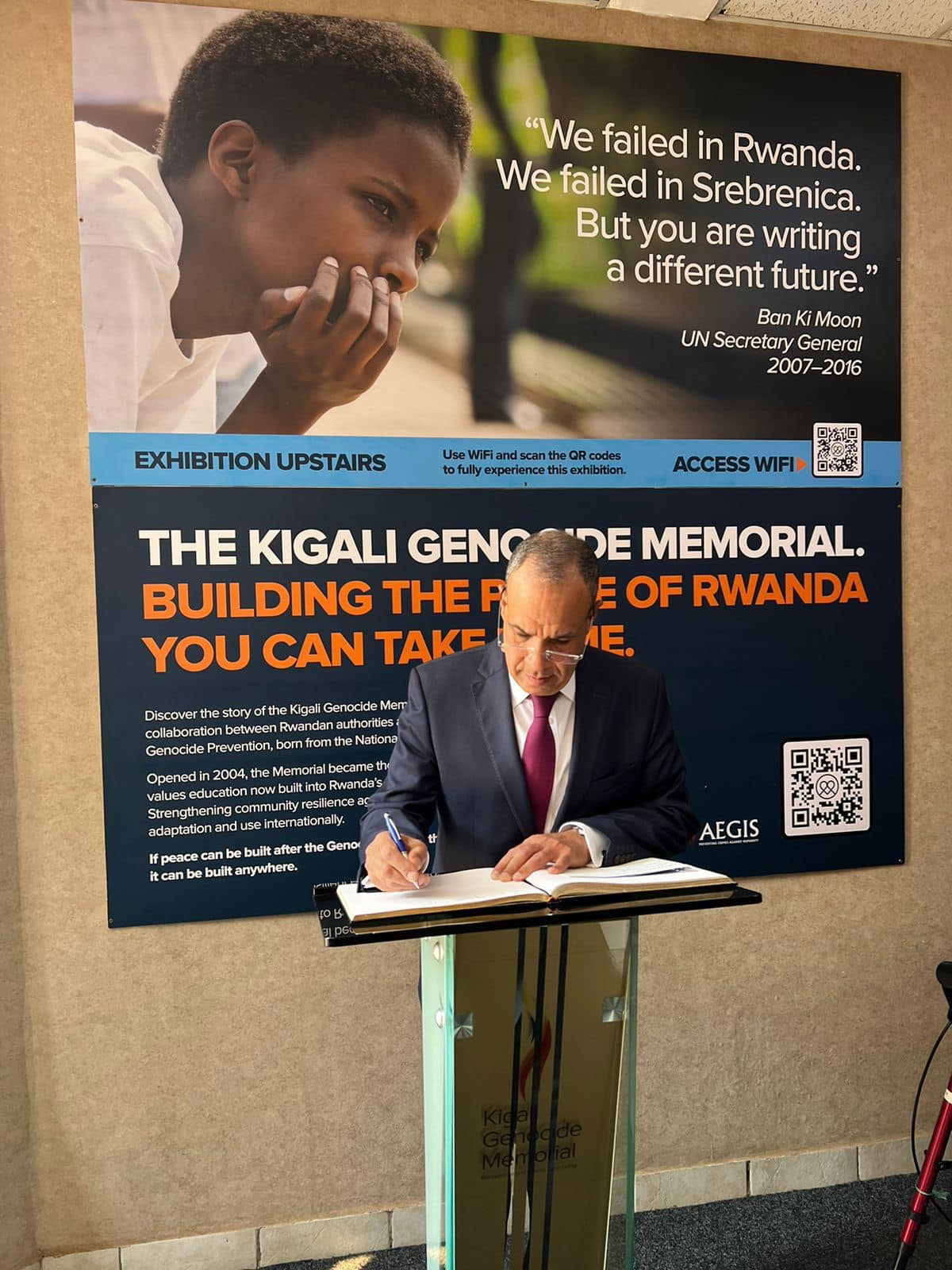 Abdelatty writes in the genocide memorial in Kigali