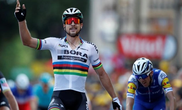 Cycling-Sagan claims third straight road race world championship title ...