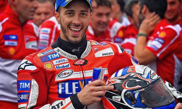 Motorcycling-Dovizioso holds off Marquez in Japanese thriller - EgyptToday